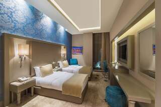 Отель Qafqaz Tufandag Mountain Resort Hotel Габала Улучшенный двухместный номер с 2 отдельными кроватями-1